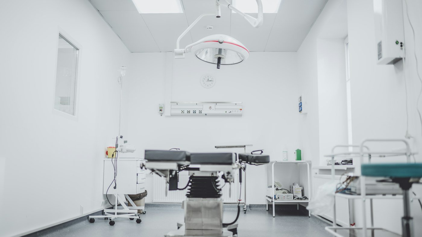 Prepared treatment room with medical equipment and supplies