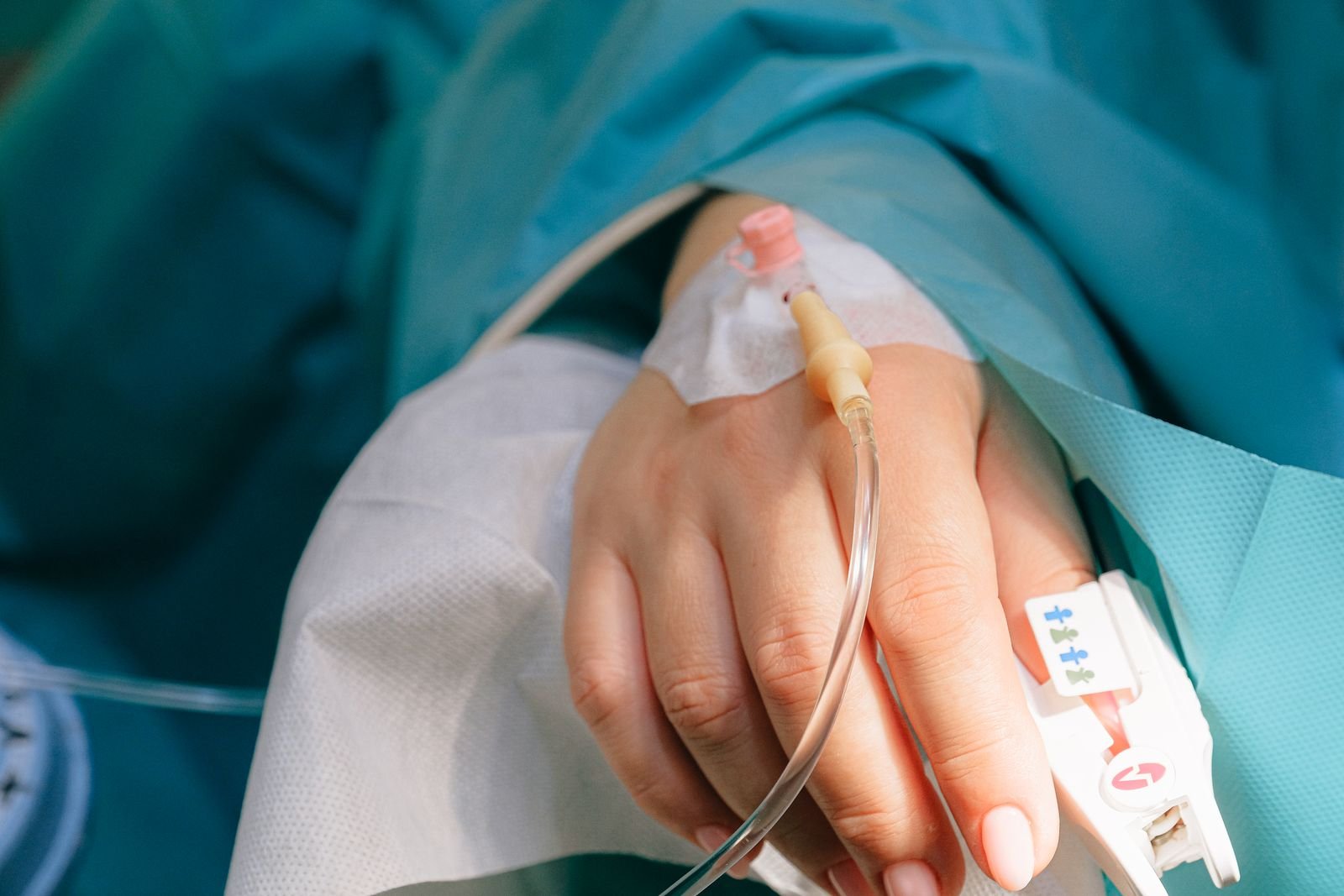 Patient receiving care with standard medical supplies in place